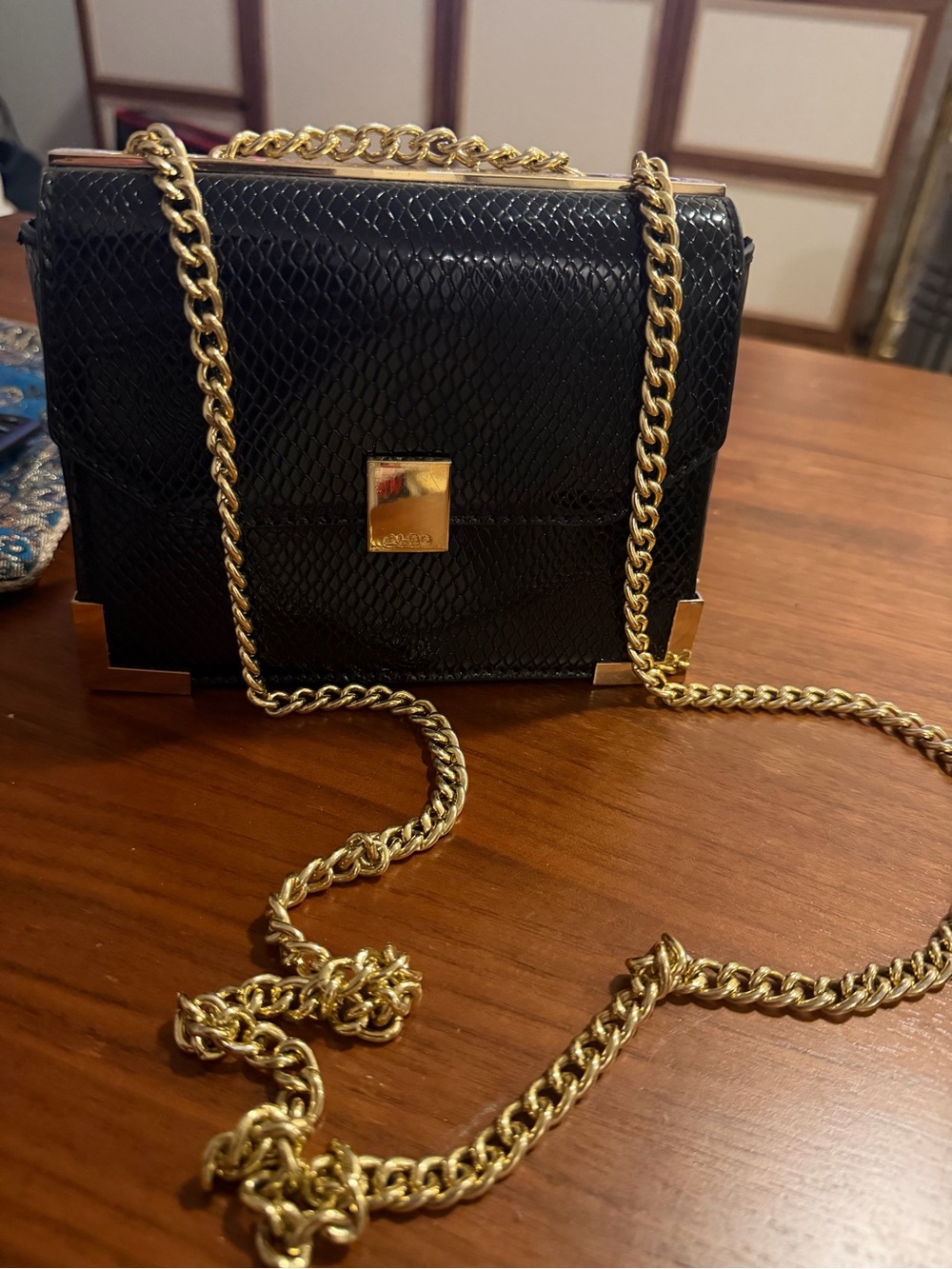 Also Black Textured Crossbody Bag with Gold Chain